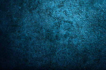Abstract water drop on dark backgroundの写真素材