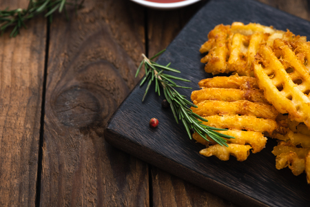 Circle French Fries on woodの写真素材