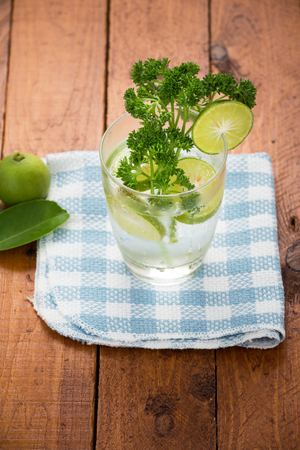 Lemon juice on woodの写真素材