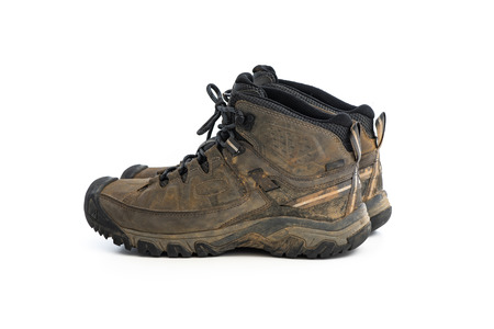 Old mountain shoe isolated on white backgroundの写真素材