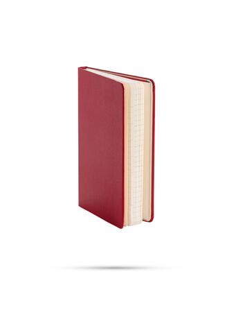 red notebook on isolated white backgroundの写真素材