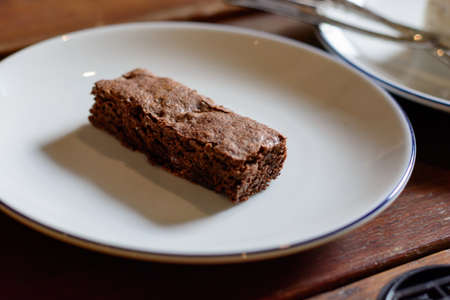 Cake chocolate brownies on wooden backgroundの写真素材