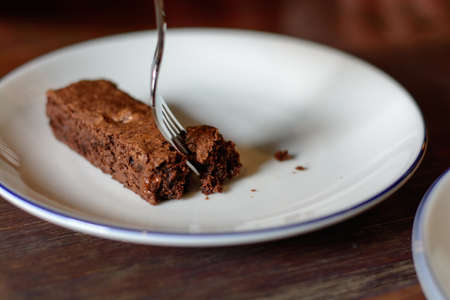 Cake chocolate brownies on wooden backgroundの写真素材