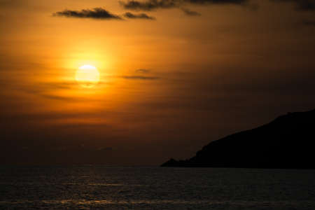 Sunset over sea at Ya Nui beachの写真素材