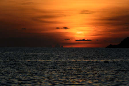 Sunset over sea at Ya Nui beachの写真素材