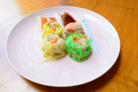 Delicious dim sims on dishの写真素材