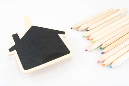 The frame as a house with color pencil on white backgroundの写真素材
