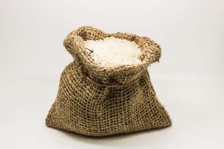 Burlap sack of riceの写真素材