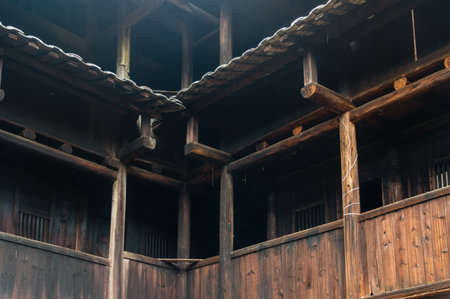 Inside an abandoned Hakka Tulou traditional Chinese housing in Fujian Province of Chinaのeditorial素材