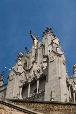 Tibidabo church in Barcelona with statue of Jesus Christ visibleの写真素材