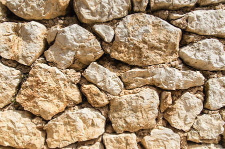 Close-up of an old stone wall.の写真素材