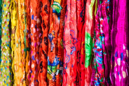 Colorful fabrics sold at an open marketの写真素材