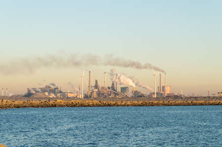 Steel factory with smoke stacks.の写真素材