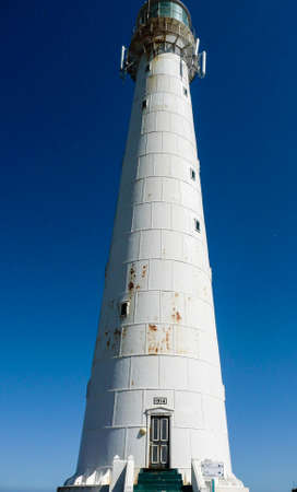 The Slangkop Lighthouse at Kommetjie, Western Cape. The Tallest Lighthouse in South Africaの写真素材