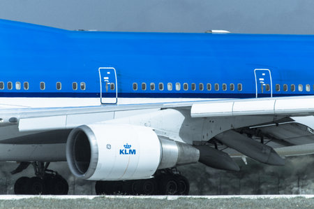 Amsterdam,The Netherlands - Augustus 24,2013 : Side of a plane with engine and wing.のeditorial素材