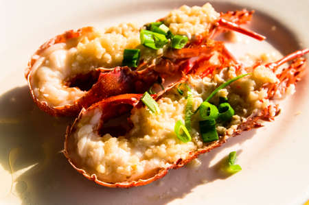 lobster with garlic and spring onions.の写真素材