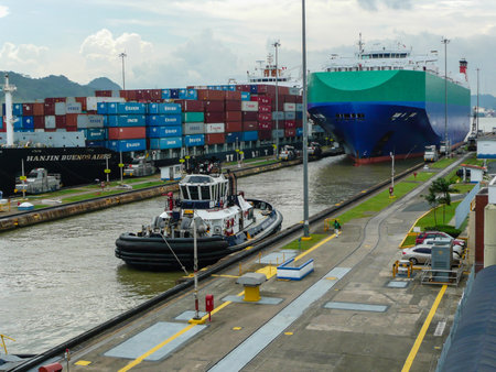 Two large ships wait to transit the Miraflores locks in the Panama Canal, just outside Panama City.のeditorial素材