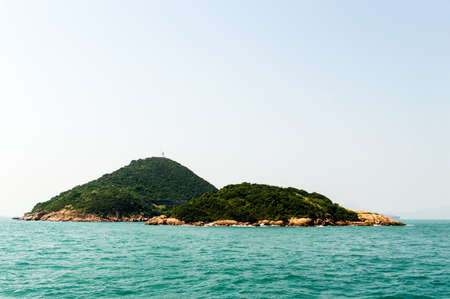 Small island near the harbour of Hong Kongの写真素材