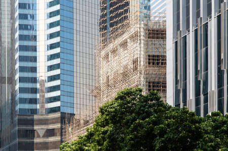 bamboo scaffolding on a office building. hong kong. china.