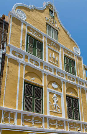 Detail of one of the monumental buildings at the waterfront of Willemstad, CuraÃ§ao in the Netherlands Antilles.の写真素材