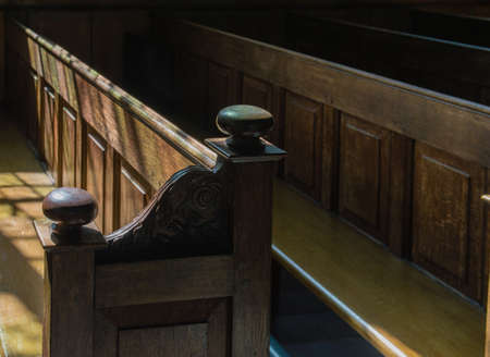 Row of Church Pews in a Churchの写真素材