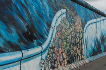 Berlin, Germany, August 30 , 2014: Part of Berlin wall on MÃ¼hlenstraÃe , The East Side Gallery,  It's a 1.3 km long part of original Berlin Wall which collapsed in 1989 and now is the largest world graffiti galleryのeditorial素材