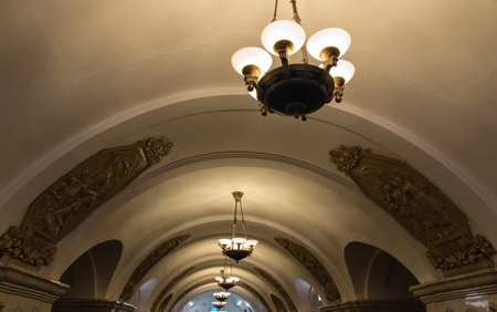 Ornate ceiling and magnificent chandeliers at metro station of the Koltsevaya Line (Circle Line), Moscow, Russia.のeditorial素材