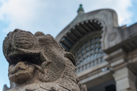 TOKYO - 9 November 2013 : Lion Guardian in the Tsukiji Hongan-ji Temple, the Buddhism temple near Tsukiji fish market which is the biggest wholesale fish and seafood market in Tokyo.のeditorial素材