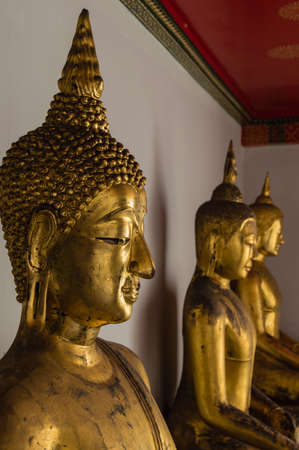 Buddha in Wat Pho Temple sequential nicely in Bangkok, Thailand