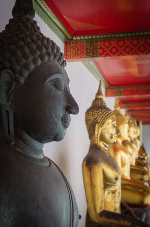Buddha in Wat Pho Temple sequential nicely in Bangkok, Thailandの写真素材