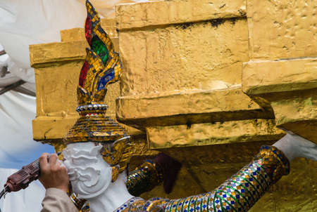 worker renovate the temple in the Grand palace in Bangkok, Thailand. The palace is the official residence of the Kings of Thailand since 1782.の写真素材