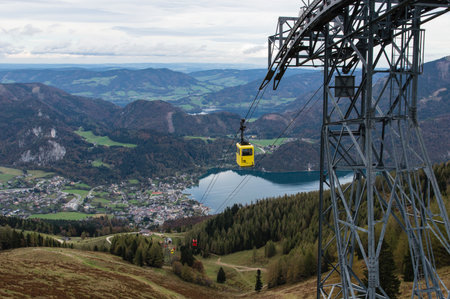 View from Zwolferhorn on Wolfgangsee and St. Gilgen with cabel car in Austriaのeditorial素材