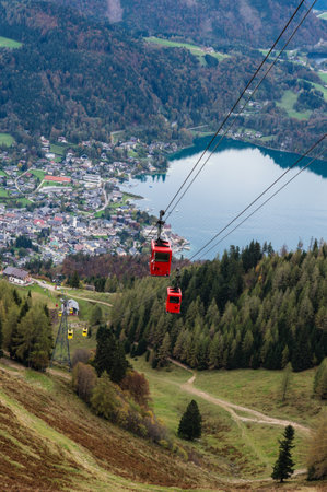 View from Zwolferhorn on Wolfgangsee and St. Gilgen with cabel car in Austriaのeditorial素材