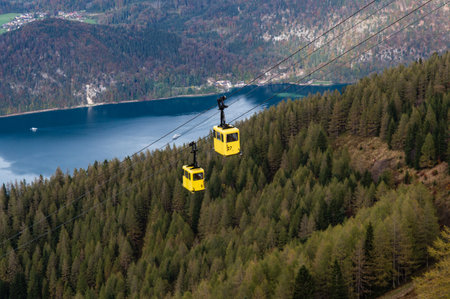 View from Zwolferhorn on Wolfgangsee and St. Gilgen with cabel car in Austriaのeditorial素材