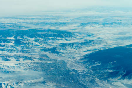 China, aerial view of Gobi Desert in western China from the airplane, Winterlandscapeの写真素材