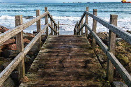 Wooden staircase leading to the Seaの写真素材