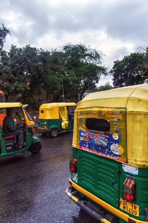 Tuk-tuk on the road in Delhi on March 03 01.2015 in Indiaのeditorial素材