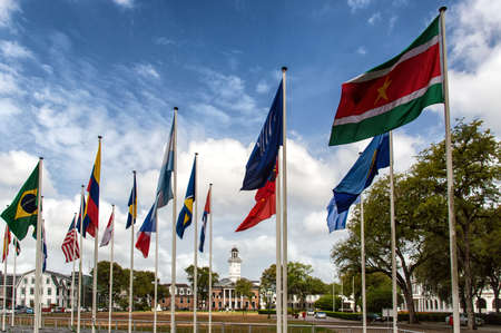 Flags of different countries of the historic city of Paramaribo, Suriname.の写真素材