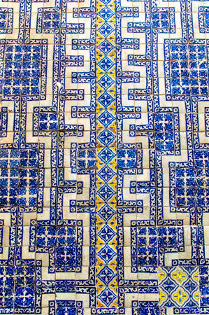 Wall of colourful Mexican Talavera tiles. The Casa de los Azulejos or House of Tiles is an...