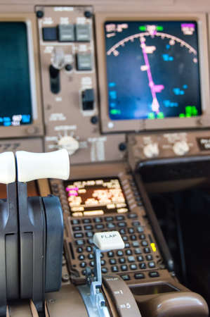 Detail of Cockpit controls inflight of a commercial airlinerの写真素材