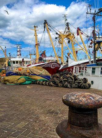 fishing trawler and nets in the harbourのeditorial素材
