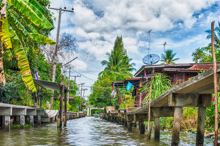 Houses on stilts. Village on a water.の写真素材