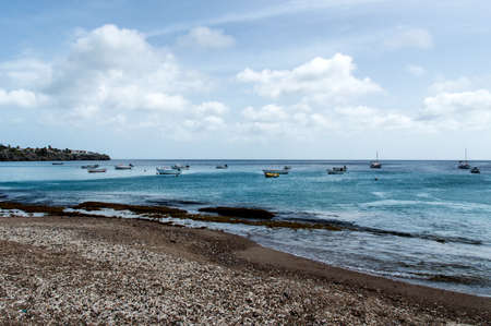 Several fishing boats are moored