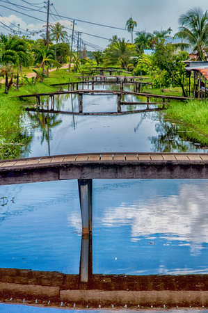 Housing and bridges at Rust en Werk plantation, Surinameの写真素材