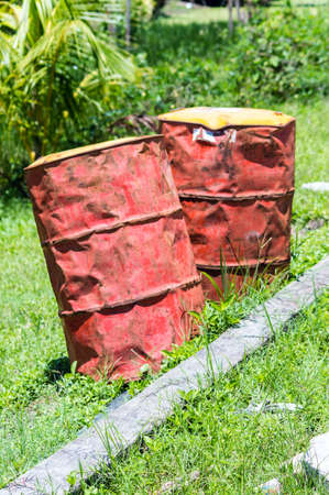 2 Old Oil Drums at the side of a road in Suriname.の写真素材