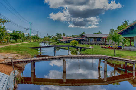 Housing and bridges at Rust en Werk plantation, Suriname