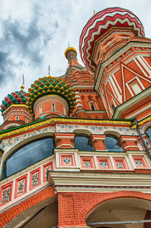 Multi-colored domes of the main Orthodox church in Moscow - St. Basil's Cathedral, a bright autumn dayのeditorial素材