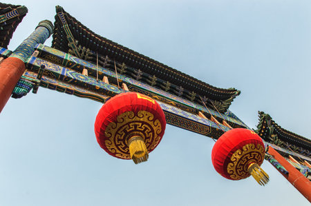 Multicolored Gate in Lama Temple (Yonghegong), Beijing, China. These gates are memorial or decorative archways, and the ones at Yonghegong are among the best known in China.のeditorial素材