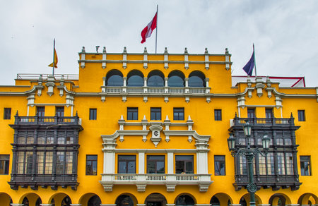 Colonial yellow building at main square called Plaza de Armas, Lima, Peruのeditorial素材