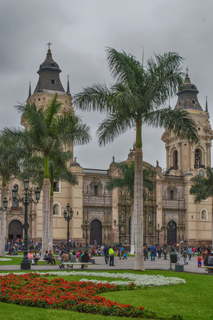 Lima, Peru - November 01, 2015: Cathedral de Lima  in the historical centre of Lima. People can be seen walking on the sidewalks.のeditorial素材